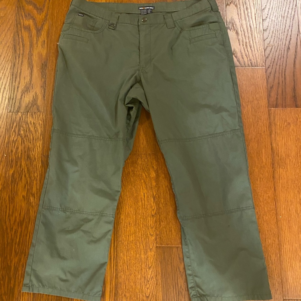 Green tactical pants.